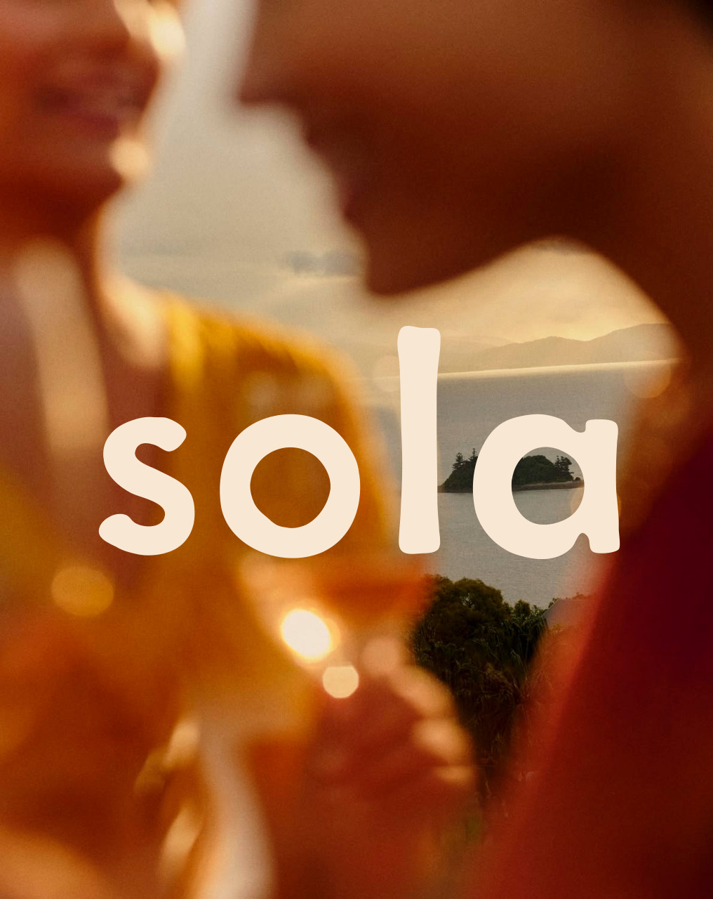 Sola wordmark over a warm, sunlit summer photograph from the designer’s brand concept
